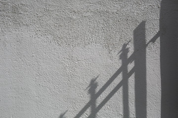 abstract wall texture with fence shadow