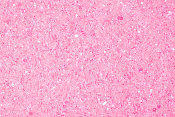 Holographic bright light pink glitter real texture background.