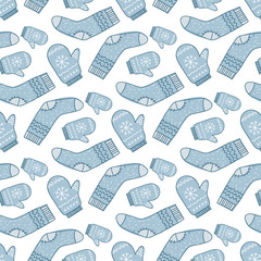 Pattern with mittens and socks. Vector ornament by hand. Christmas design