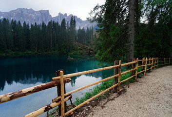 Fototapeta na wymiar Dolomites mountains at Carezza lake of Alto Adige