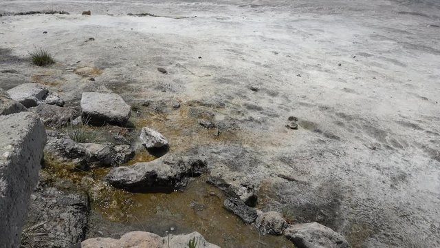 Pamukkale, Denizli, Turkey - 16th of July 2019: 4K Spring water runs along sinter terrace