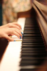 hands on the piano