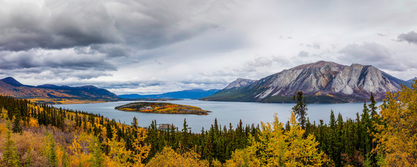 Fototapeta premium Lake with Island in Autumn Colors, Mountains