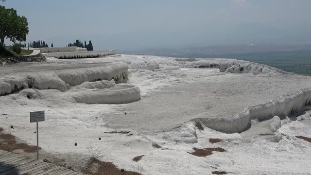 Pamukkale, Denizli, Turkey - 16th of July 2019: 4K White sinter terraces with no people on them