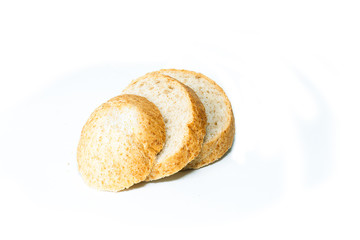 loaf of bread with sesame seeds isolated on white