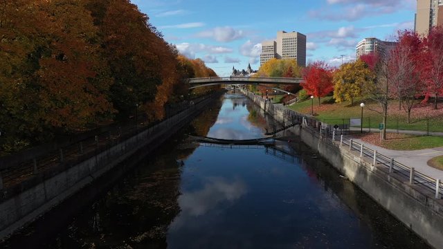 Low fly by aerial ottawa rideau canal colorful 