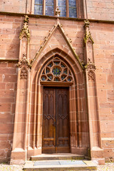 Fototapeta na wymiar Stiftskirche Kyllburg or Collegiate Church of Kyllburg in Bitburg, Pruem, Rhineland-Palatinate, Germany Gothic entrance decoration