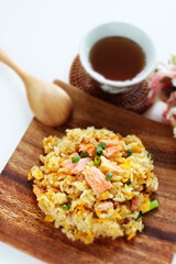 Chinese food, salmon and green pea fried rice
