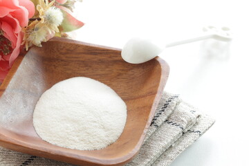 White agar powder on wooden plate for cooking image