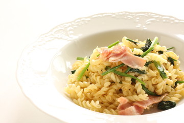Italian food, bacon and spinach Fusilli short pasta