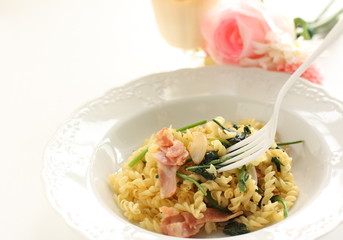 Italian food, bacon and spinach Fusilli short pasta