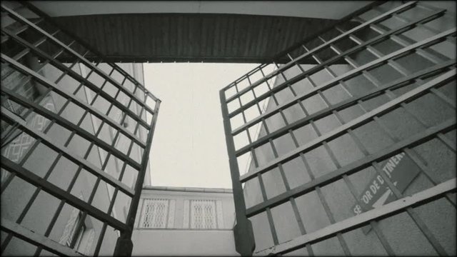 Prison building from Eastern Bloc during communist era (1940s, 1950s).
Archive, black and white footage.
