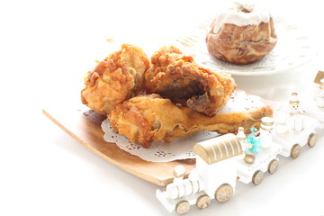 Icing cake and fried chicken for Christmas 