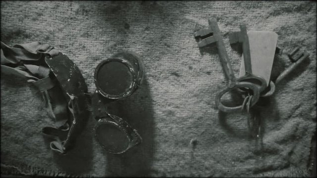Prison objects from Eastern Bloc during communist era (1940s, 1950s).
Archive, black and white footage.