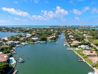 Aerial view of Bay Island neighborhood, luxury villas and boat, in Sarasota, Florida, USA