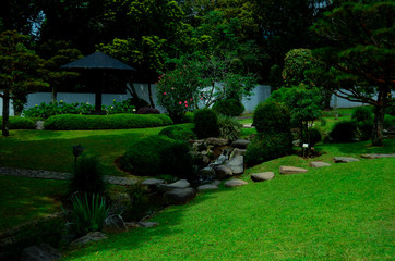 garden with pond and gazebo