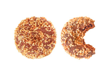Bitten donut chocolate sprinkled with nuts  isolated on white background with clipping path