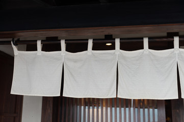 The curtain-like fabric that hangs in front of traditional Japanese restaurants and shops not only serves as a signboard, but holds a larger meaning,