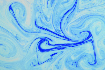 Abstract painting technique Ebru .Turkish style Ebru on the water with acrylic paints press...