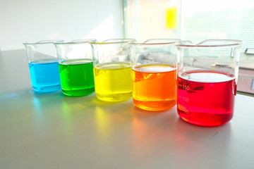 colorful beaker in laboratory