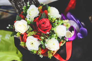 Roses white surrounded by red roses.