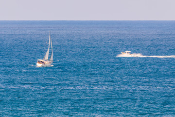 Fototapeta premium Two small white yachts on Mediterranean Sea