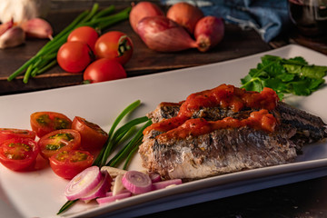  fresh sardines with tomato sauce and other vegetables