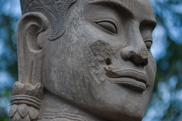 Fototapeta na wymiar Siem Reap, Cambodia - January 23, 2011: Mythological statue in the Angkor Wat archaeological Park