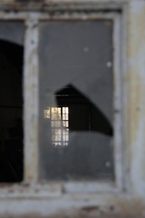 Fototapeta na wymiar broken window glass at old buildings