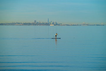 Fototapeta na wymiar Paddleboarding on San Francisco Bay