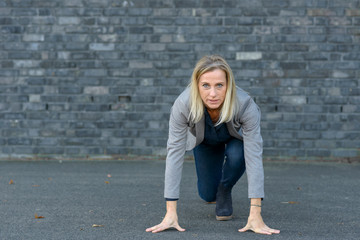 Business woman in starting position