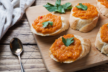 Sandwiches with bread zucchini caviar tomatoes onions. Homemade vegetarian food. Copy space.