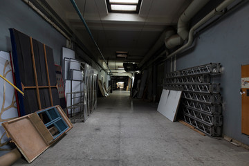 Long dark corridor in an old industrial building