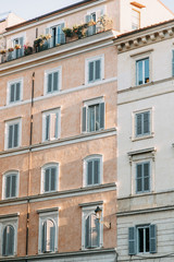 Fototapeta na wymiar Architecture and buildings of old Italy. Evening panorama of the streets of Rome.