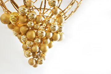 A bunch of gold balls on a white background.