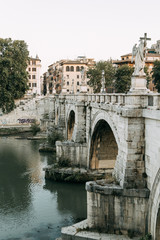Obraz premium Sights and ancient places of Italy. Angel bridge in Rome at dawn.