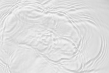 Water waves on the pool. Abstract background. Black and white concept.