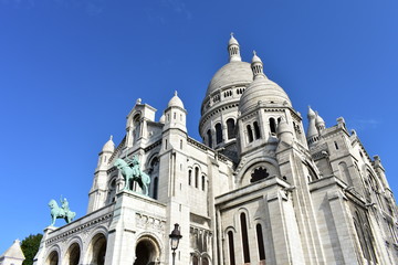 Fototapeta na wymiar Sacre Coeur Basilica, perspective from below. Paris, France.