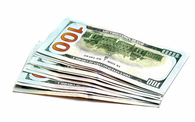 One hundred dollars. Money. Paper bills in denominations of one hundred dollars. Business and Finance.