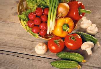 Vegetables . Fresh Bio Vegetable in a Basket. Over Nature Background