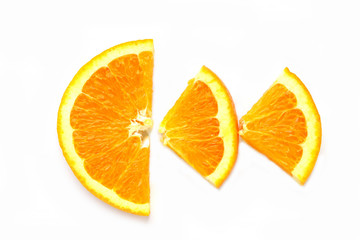 Sliced ​​Orange. Different shaped pieces of fruit.