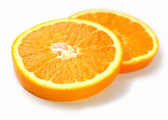 Sliced ​​Orange. Different shaped pieces of fruit.
