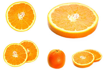 Sliced ​​Orange. Different shaped pieces of fruit.