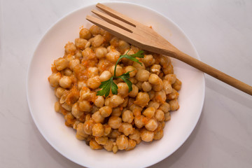 Cooking chickpeas bowl stone background top view