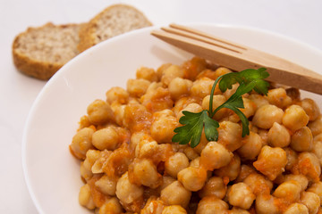 Cooking chickpeas bowl stone background top view
