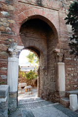 Fototapeta na wymiar Spain - Malaga City, a Moorish archway in the Alcazaba monument.