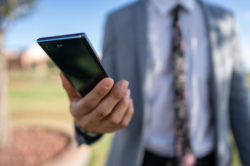 hand holding smart phone
