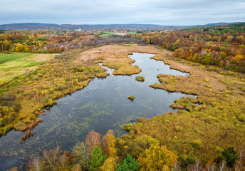 Aerial view over Swedish lake end in October