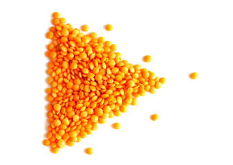 Red lentils on white background. Different forms of dry lentils. Lentils red in a transparent glass jar. Handful of legumes.