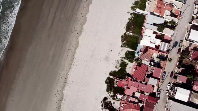 Panning top view aerial shot of estero beach in Ensenada mexico